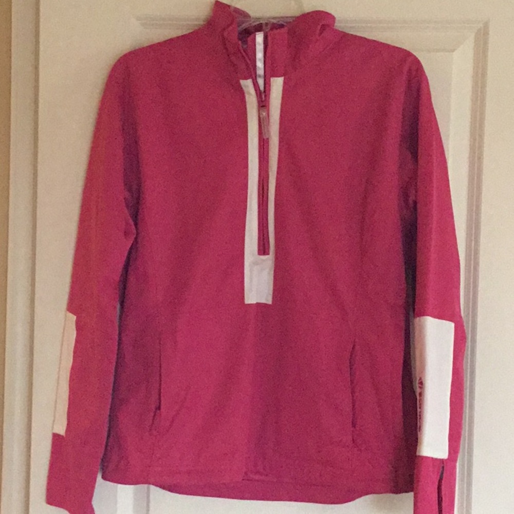 Pink and white jacket.    Sunice